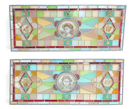 Pair of good lead framed stained glass panels, each with a central circular portrait and floral lozenge panels, 42" x 17" (2)