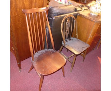 Two pairs of Ercol dining chairs. 