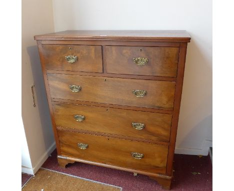 A 19th Century oak chest of two short over three long drawers, raised on carved bracket feet. H-114cm, W-100cm, D-46cm 