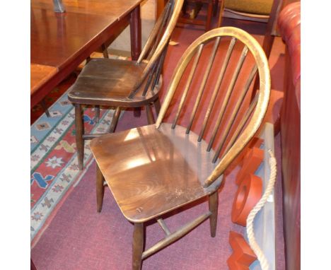 A set of seven Ercol dining chairs. 