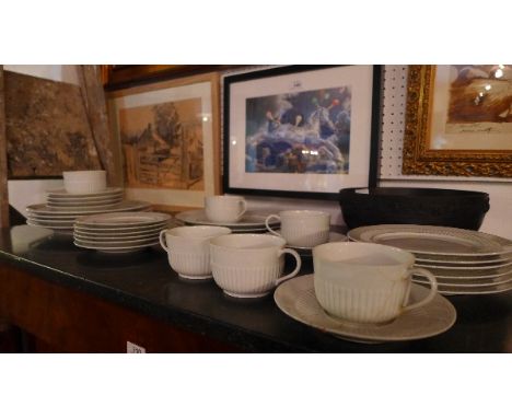 A Limoges part tea service, together with a Wedgwood basalt bowl, diameter: 25cm