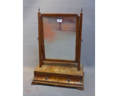 A Georgian walnut toilet mirror with single drawer, raised on bracket feet. 
