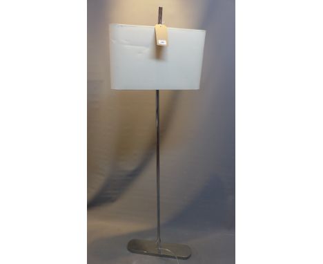 A contemporary chrome standard lamp. 