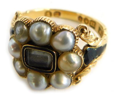 A George IV gold and pearl cluster memorial ring, with a central brass locket and surround of eight pearls, black enamelled s