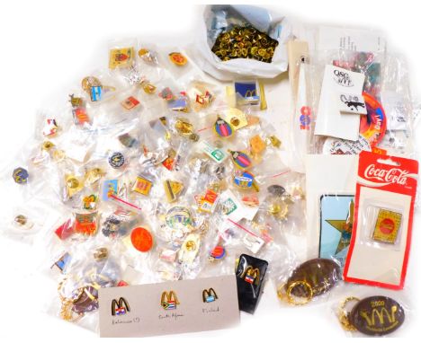 A group of McDonalds enamel pin badges, for Chicago 99, UK Operations Conference, McDonalds Pakistan, McDonalds Disney Global