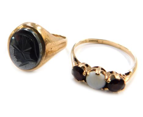 Two 9ct gold rings, being a signet ring with centurion intaglio, size O 1/2,&nbsp; the other opal and garnet, size T, 6.2g al