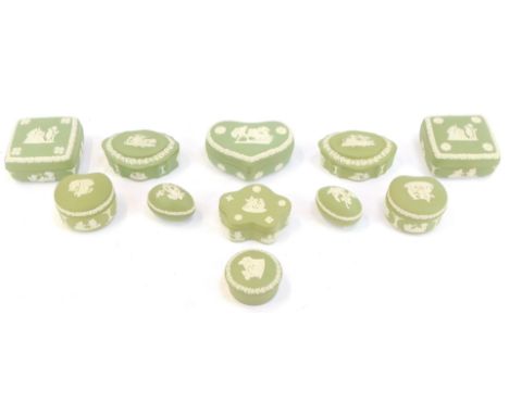 A group of green Wedgwood jasperware trinket boxes, of varying shapes, to include a square shaped box, 9.5cm wide, heart shap