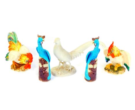 A group of ceramic birds, comprising a Portuguese bisque porcelain pheasant, stamped to underside Made in Portugal, 24cm high