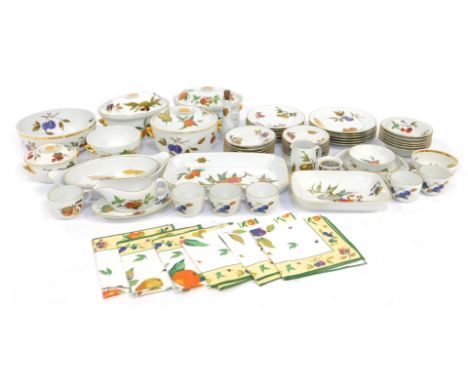 A group of Royal Worcester Evesham pattern tea and dinner wares, to include teacups and saucers, tureens and covers, serving 