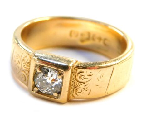 A Victorian two colour 18ct gold gentleman's diamond solitaire ring, with floral chased shoulders and old cut diamond, 3.8mm 