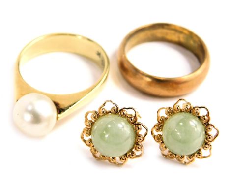 A pair of Chinese jadeite set ear studs, yellow metal, within pierced scroll borders, stamped China 14k, yellow metal ring se