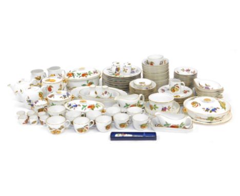 A group of Royal Worcester Evesham pattern tea and dinner wares, to include dinner plates, teapots, flan dishes, teacups and 