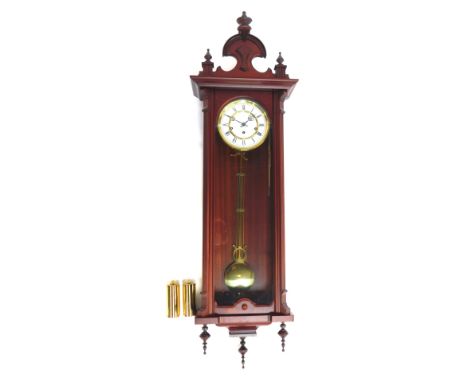 A Rapport of London mahogany cased wall clock, the white enamel circular dial bearing Roman numerals, brass chapter ring, eig