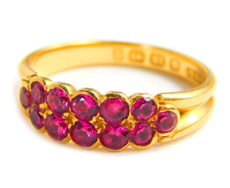 A Victorian 18ct gold garnet dress ring, London 1890, size O 1/2, 3.7g all in.&nbsp;