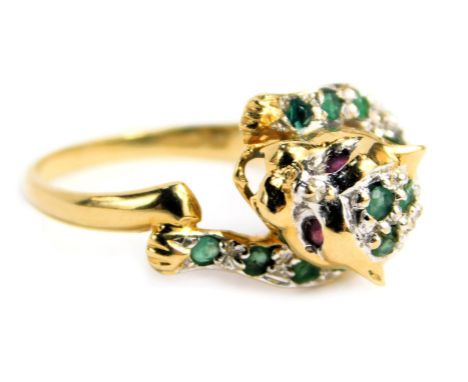 A modern 18ct gold leopard ring, fashioned as a head and legs of a leopard, in a leaping pose, set with numerous peridots, si