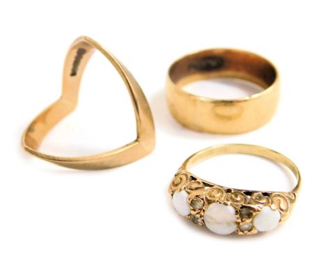 Three 9ct gold rings, comprising a plain broad band, plain chevron ring, and an opal set three stone half hoop ring, 9.9g all