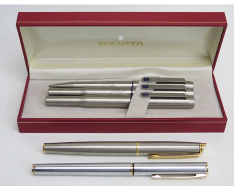 A Sheaffer fountain pen, a waterman fountain pen and parker pens.