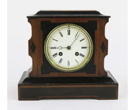 A late Victorian Japy Freres mahogany and ebony mantel clock, with square shaped case on a plinth base, having a 9.5cm Roman 