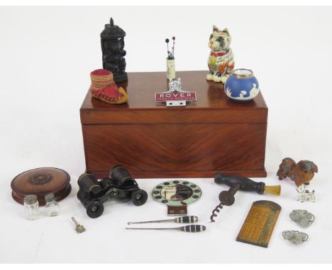 A walnut veneered rectangular box containing assorted collectables including pull corkscrew, carved ebony figure of Ganesha, 