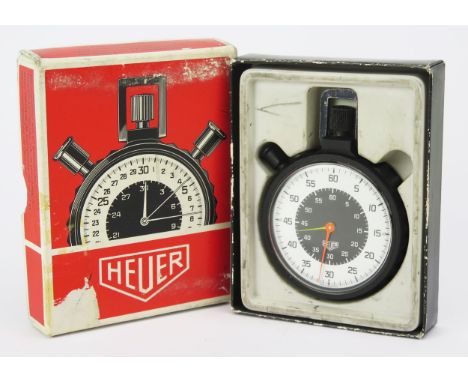 A HEUER Stopwatch, 62mm case, caliber 412, boxed. Running