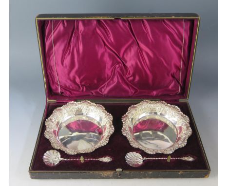 An Edward vii silver strawberry set, maker Fenton Brothers Ltd, 1901/02/05, includes two dishes with embossed foliate and scr