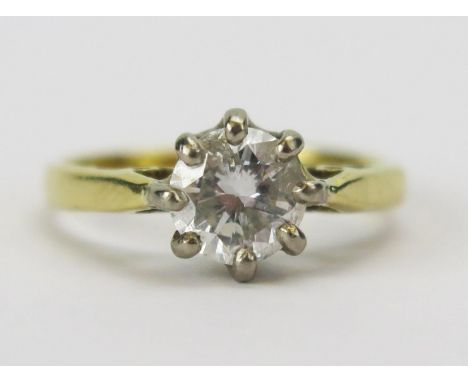 An 18ct Gold and Natural Diamond Solitaire Engagement Ring, c. 6.34mm brilliant round cut, size L.5, hallmarked, 2.95g. Warre