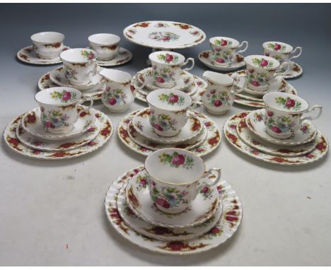 A Royal Albert 'Chatelaine' pattern part tea service, includes comport, six cake plates, ten side plates, eight saucers, nine