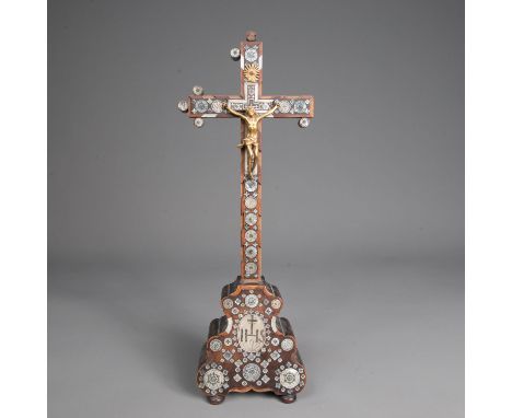 A Jerusalem Cross. On baroque curved base on four feet. Oilve wood , mother of pearl and other woods. Rich intarsias with eng