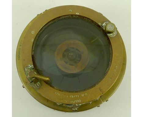 A WWII brass Azimuth Circle no.4 military aircraft compass, O.2.B 44226E, 16.5 by 10cm.