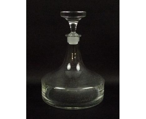 A Whitefriars cut glass ship's decanter and stopper of plain form, 24cm high. 