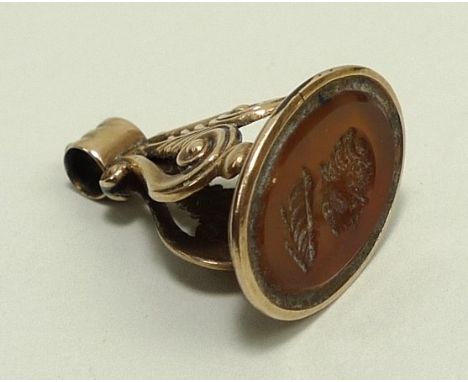 A Regency gold and cornelian set fob seal intaglio carved with a bust portrait of a gentleman, 4.4g.