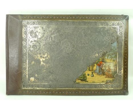 A Persian leather book or folio case, early 20th century, the front with a white metal panel engraved with exotic birds, temp