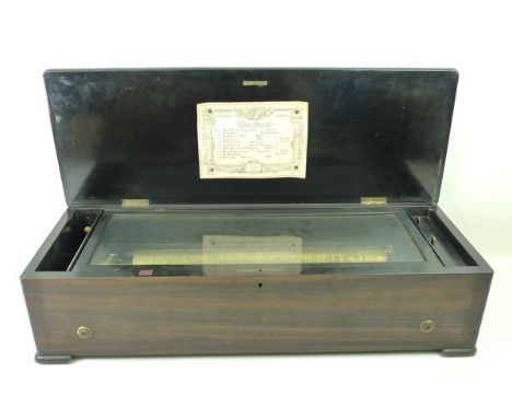 A Swiss musical box, J M and Co, St. Croix, playing ten airs, in a rosewood box strung with box wood, floral marquetry, and c