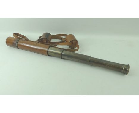 A brass five draw telescope in leather case, with maker's mark, Broadhurst Clarkson & Co, 69 Fenchurch St, EC3, stamped. 