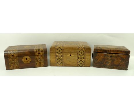 A Victorian walnut and inlaid sewing box, 23 by 16 by 12cm, another similar, 22 by 15 by 11cm, and a tea caddy, 18 by 10 by 1