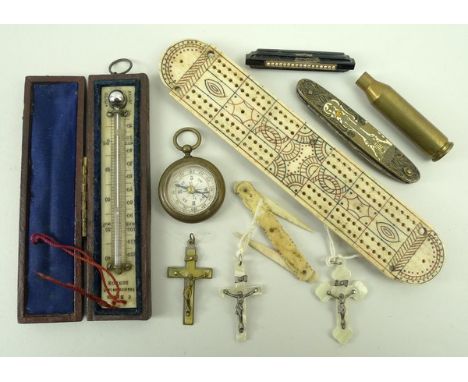 A Napoleonic period prisoner of war bone cribbage board engraved with coloured decoration, an Edwardian ivory thermometer by 