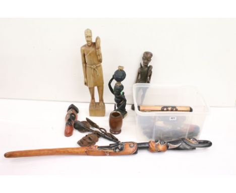 Ethnographica - Collection of 16 carved African wooden items to include masks, figures, spoon implements and a staff (approx 