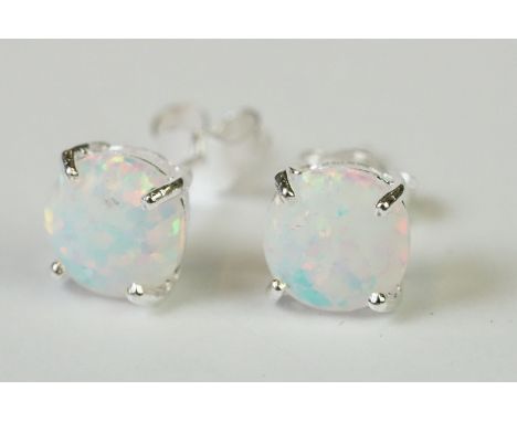 A pair of silver and opal stud earrings 