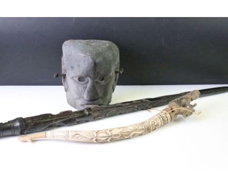 Ethnographica - Three Indonesian Lake Toba, Sumatra items including carved bone flask with relief lizard decoration and figur