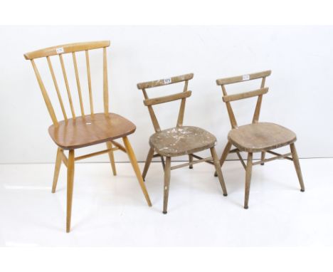 Pair of Ercol Elm and Beech Child's Yellow Dot Stacking School Chairs, each 38cm wide x 58cm high together with a single Erco
