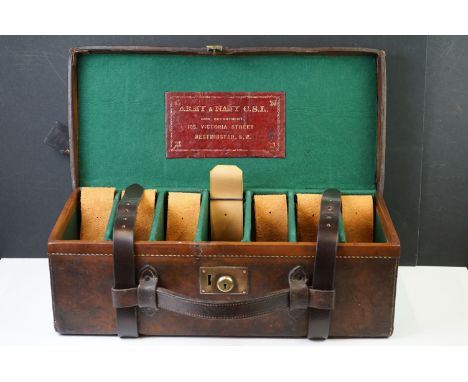 ' The Army &amp; Navy C.S.L ' large leather 7-section shotgun cartridge case with fitted interior, makers label to lid interi