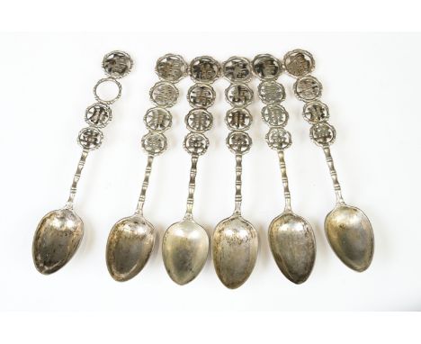 A set of six Chinese silver tea spoons with character marks to finials and maker marks to bowls. 