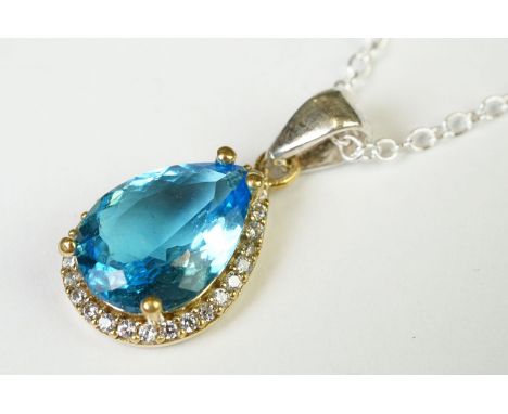 Silver, CZ and faux sapphire pear shaped pendant necklace on silver chain