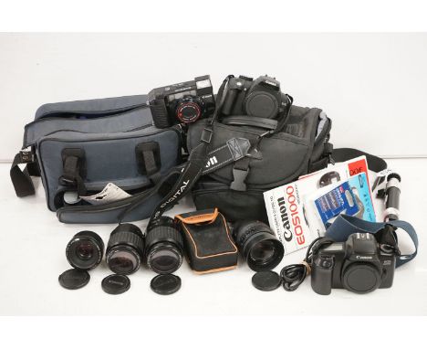 Canon EOS 350D digital camera with battery, charger, carry strap and 3 lenses (Zoom Lens EF 80-200mm 1:4.5-5.6; EF 50mm 1:1.8