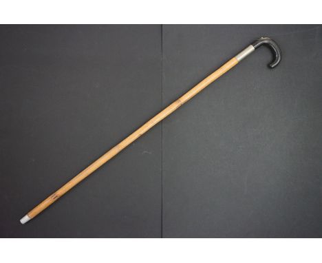 Early-to-mid 20th century bamboo horse measuring walking stick, the curved handle with removable measure with scale in hands 