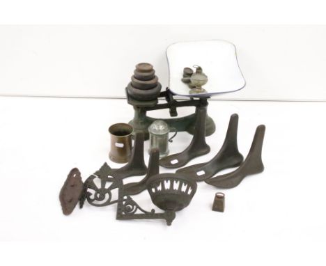 A box of mixed collectable to include a collection of cast iron shoe formers, pewter shaker, Indian Wooden Horse and a set of