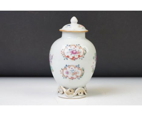 Chinese Famille Rose Tea Caddy and Cover, painted with flowers and foliage, the base with scrolling gilt decoration, 12.5cm h