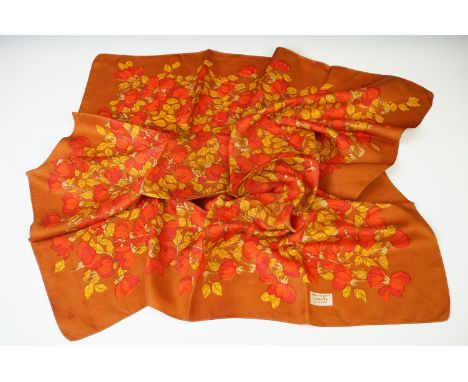 1960's Liberty of London Silk Scarf with red flower pattern on a brown ground, 66cm x 66cm 
