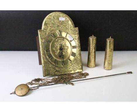 West German Schmeckenbecher brass wall clock with scrolling acanthus leaf &amp; floral design, Roman numerals, pendulum &amp;