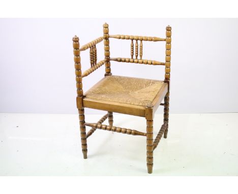 Bobbin turned corner chair, with rush seat, 73.5cm high x 42cm wide x 42cm deep 